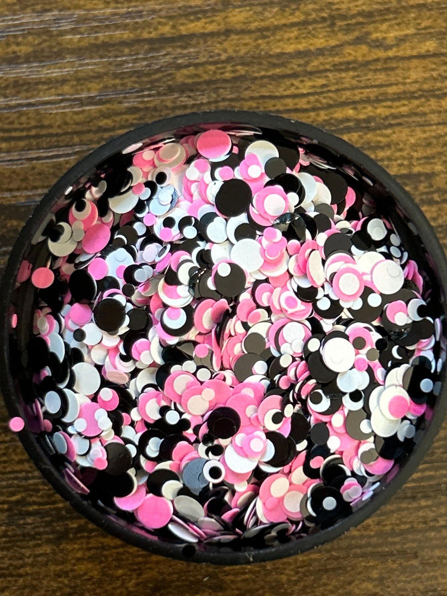 Pink, white and black round