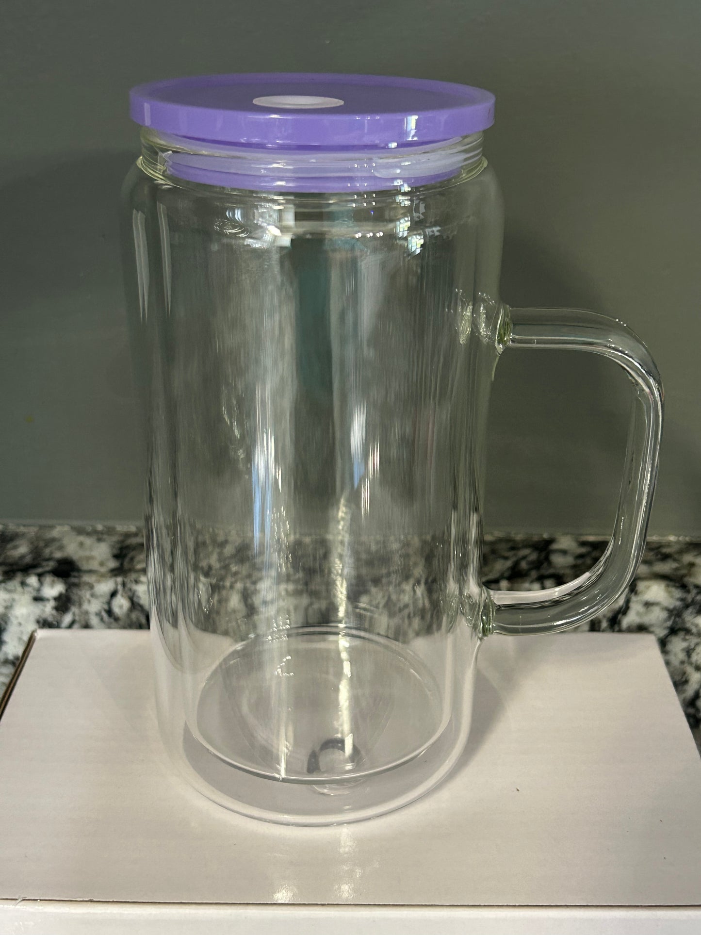 16 oz glass with handle. Colored lids and colored straws