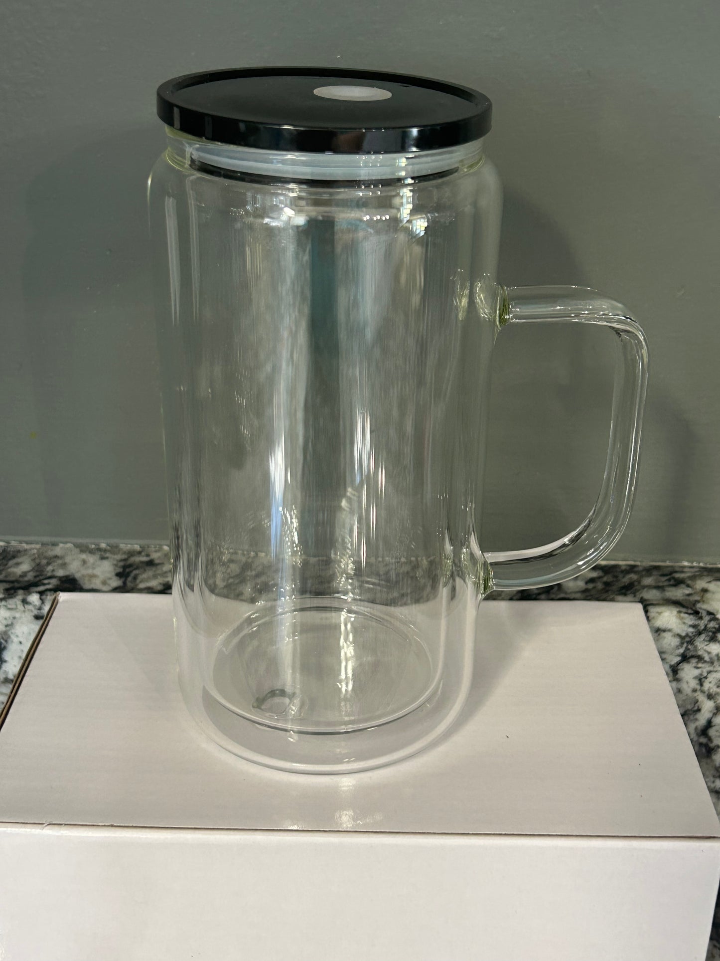 16 oz glass with handle. Colored lids and colored straws