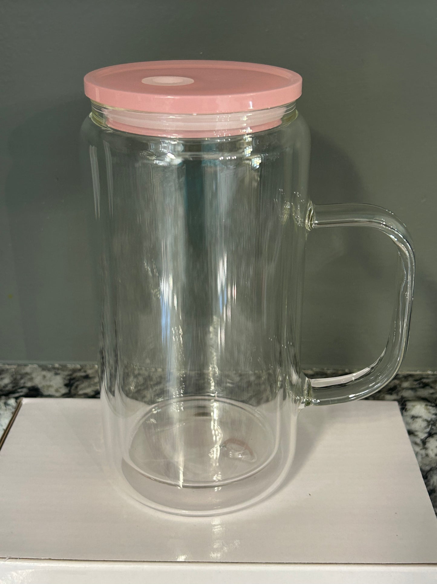 16 oz glass with handle. Colored lids and colored straws